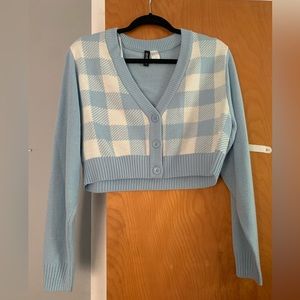 blue and white checkered sweater vest